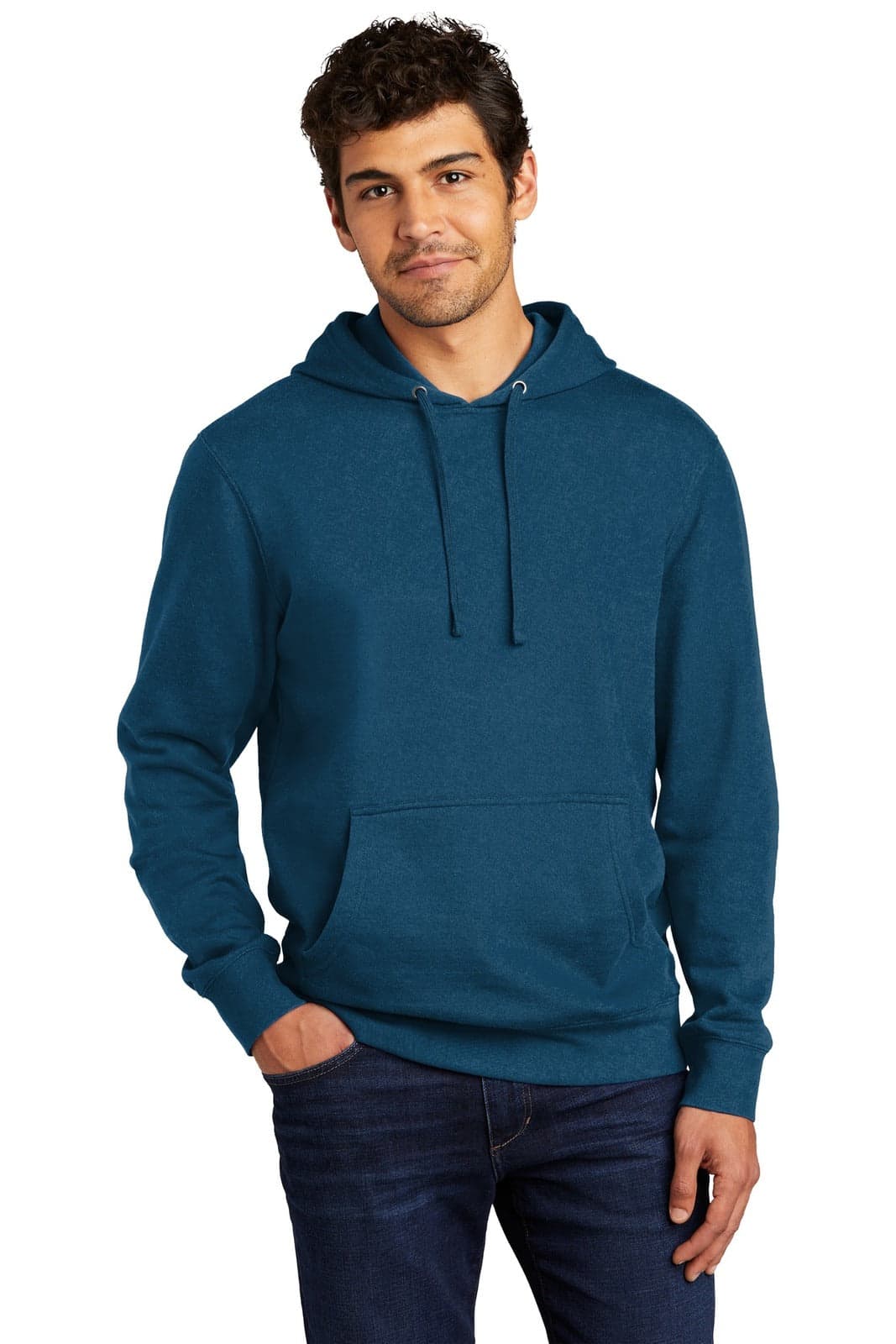 A teal fleece hoodie is worn by a man standing with his hands in the pockets, featuring a hood and a logo.
