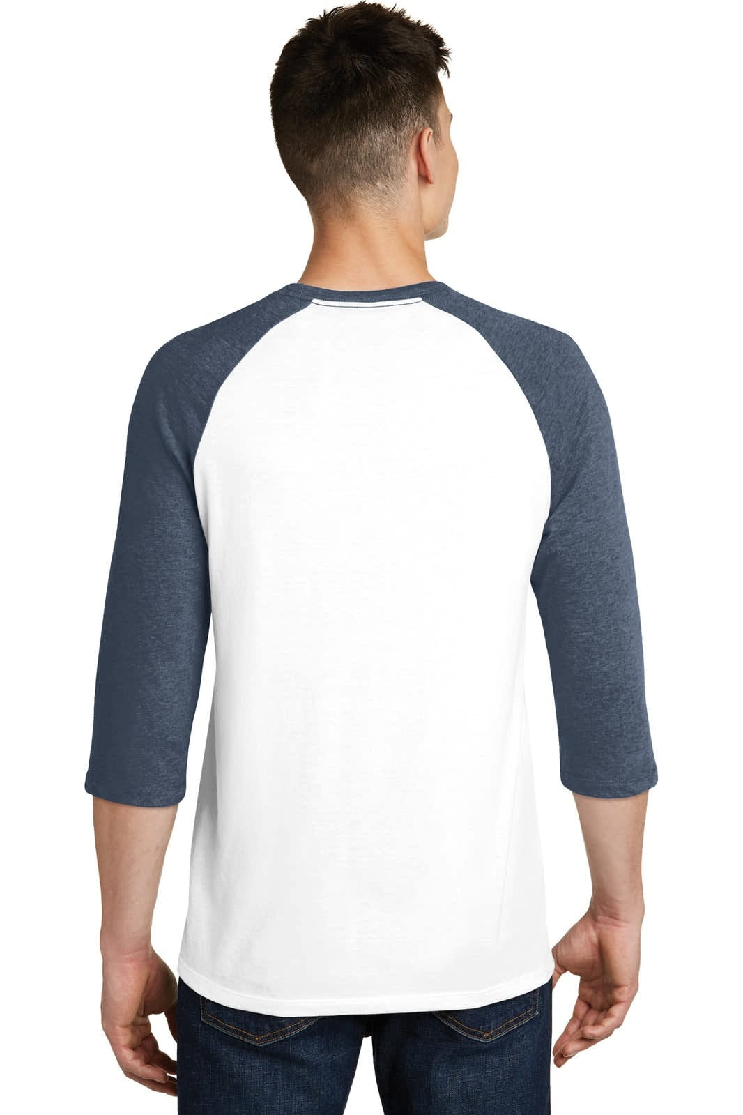 A young man wearing a white 3/4-sleeve raglan t-shirt with navy sleeves, showing the back view of the shirt.