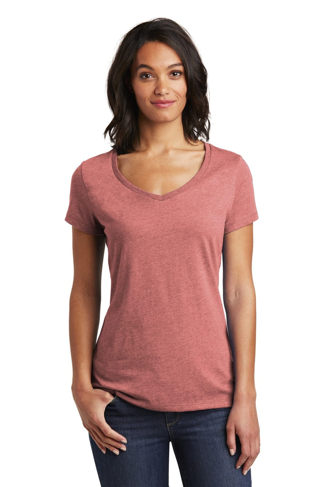 A woman wearing a rose-coloured V-neck t-shirt with short sleeves and a relaxed fit. The shirt features a logo.