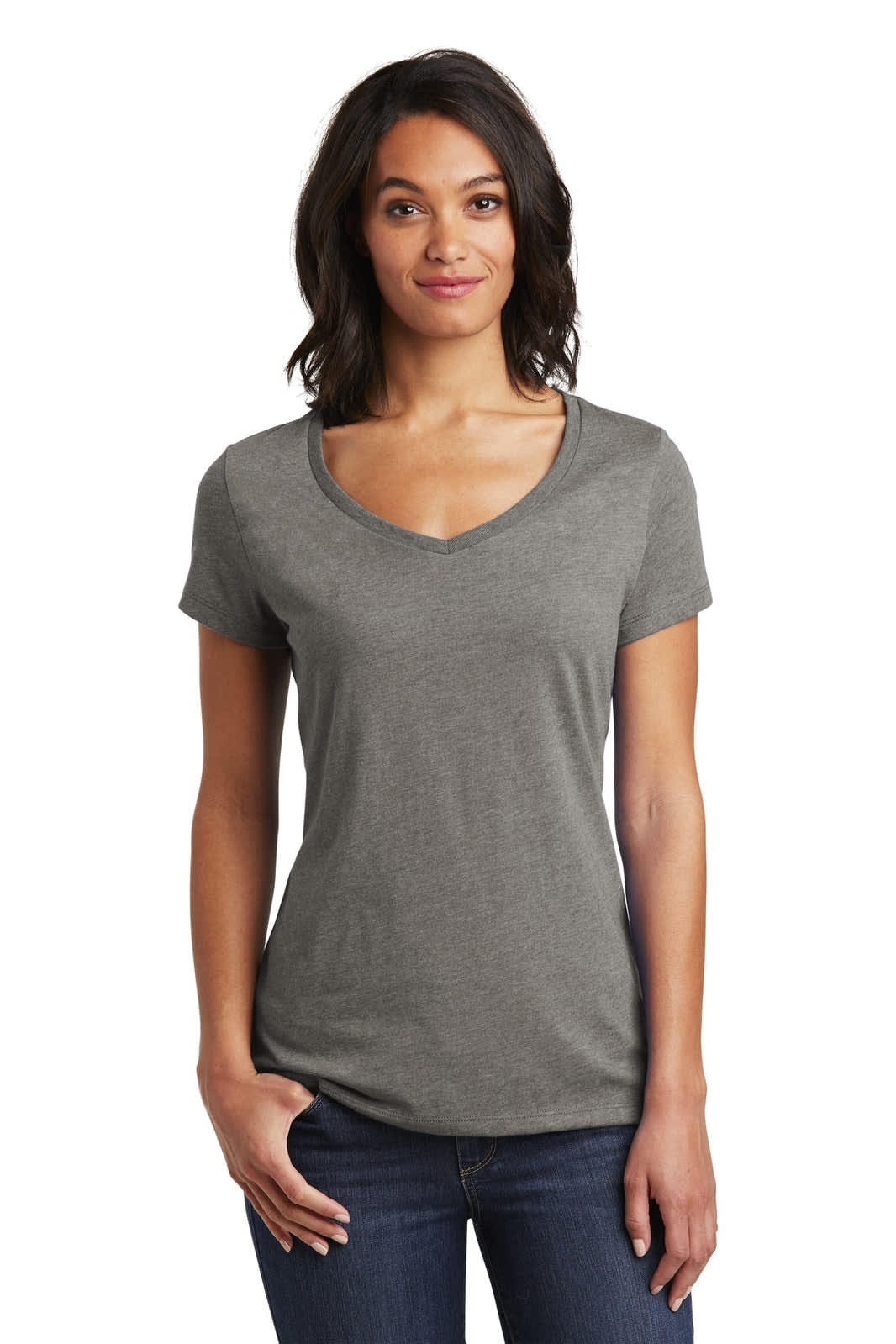 A woman is wearing a grey V-neck t-shirt. The shirt features short sleeves and a fitted style.