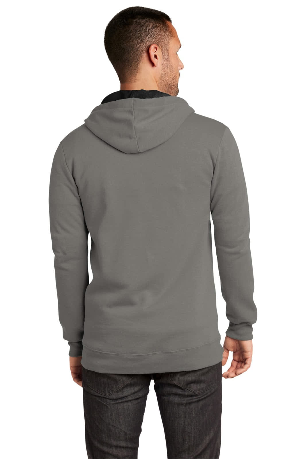 A young man wearing a grey full-zip hoodie with a hood, viewed from the back. The hoodie has a logo.