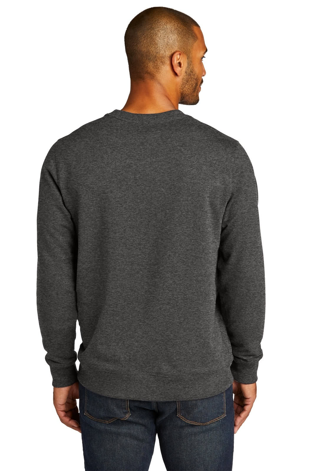 A grey crew jumper featuring a simple design and a logo on the back. The model is wearing jeans.