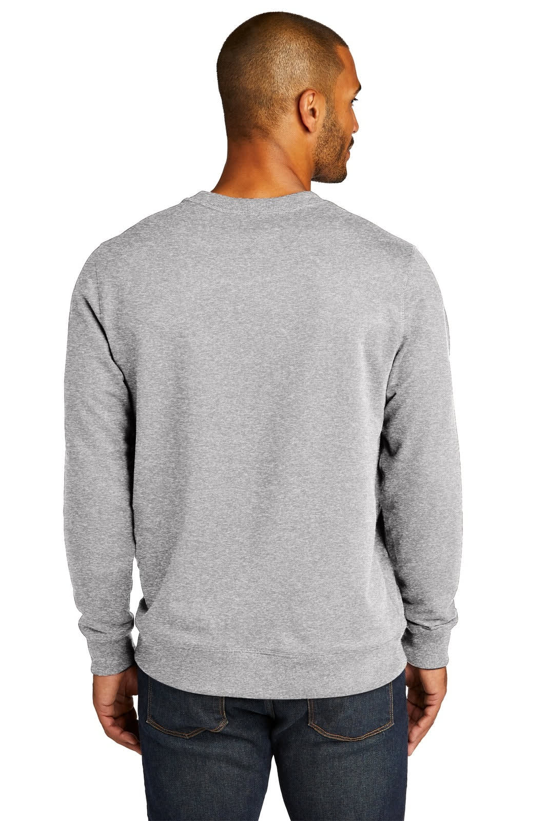 A man is seen from the back wearing a grey crew jumper, featuring long sleeves and a simple design.