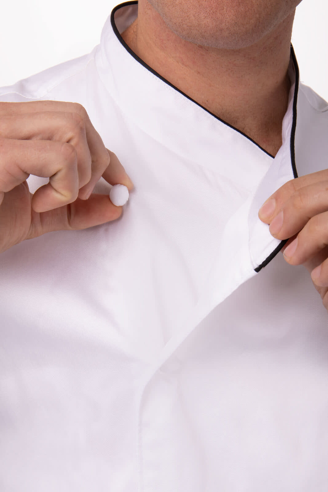 A white men's chef jacket with a black collar detail, featuring a close-up of the collar being adjusted.