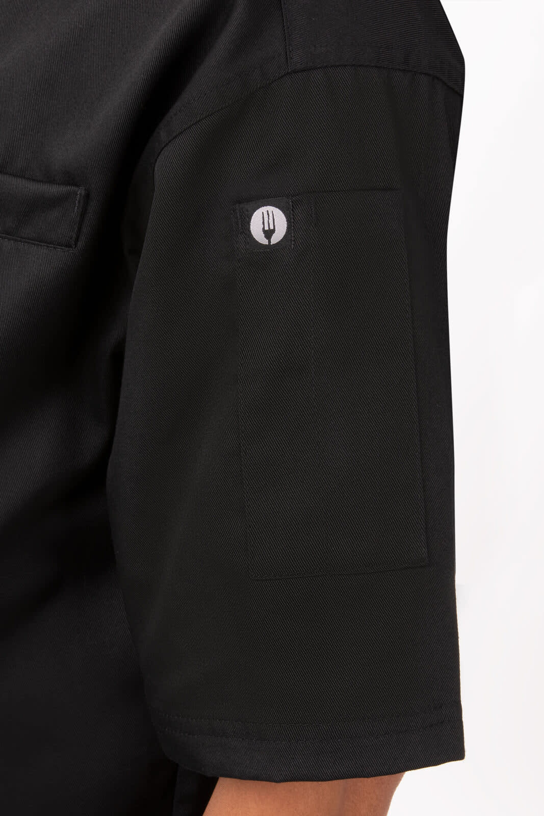 A black executive chef jacket featuring a pocket on the sleeve and a logo.