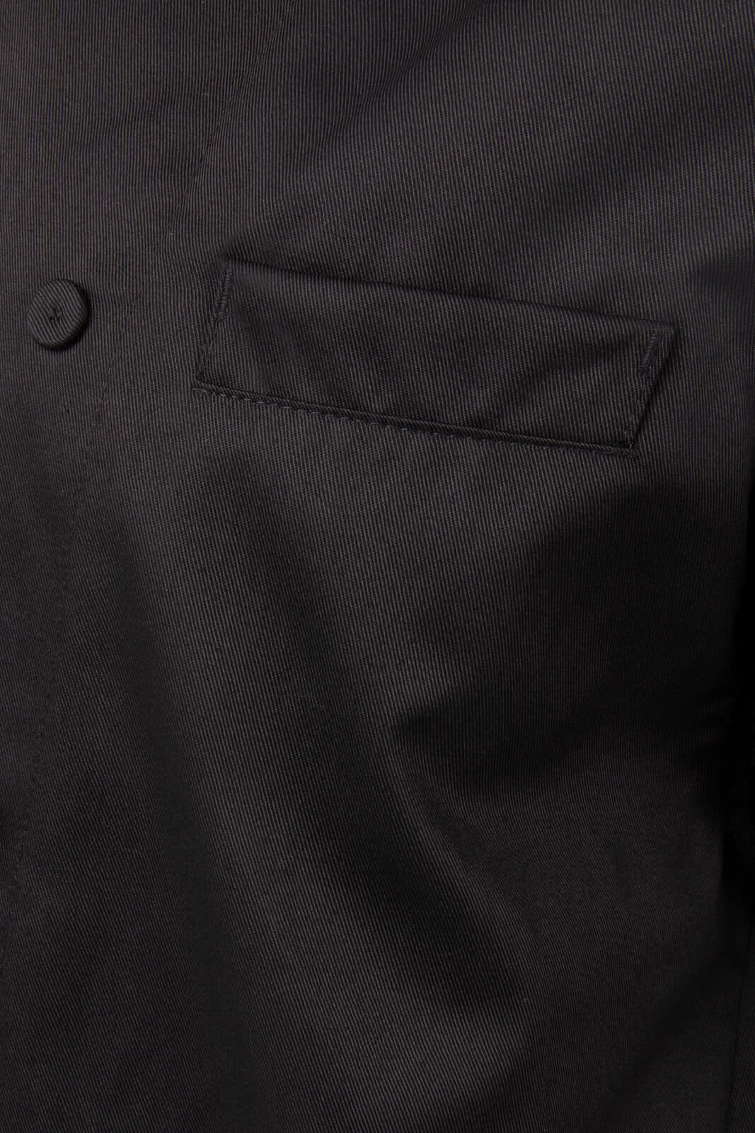 A black chef's jacket featuring a button and a pocket detail. The fabric appears smooth and durable.
