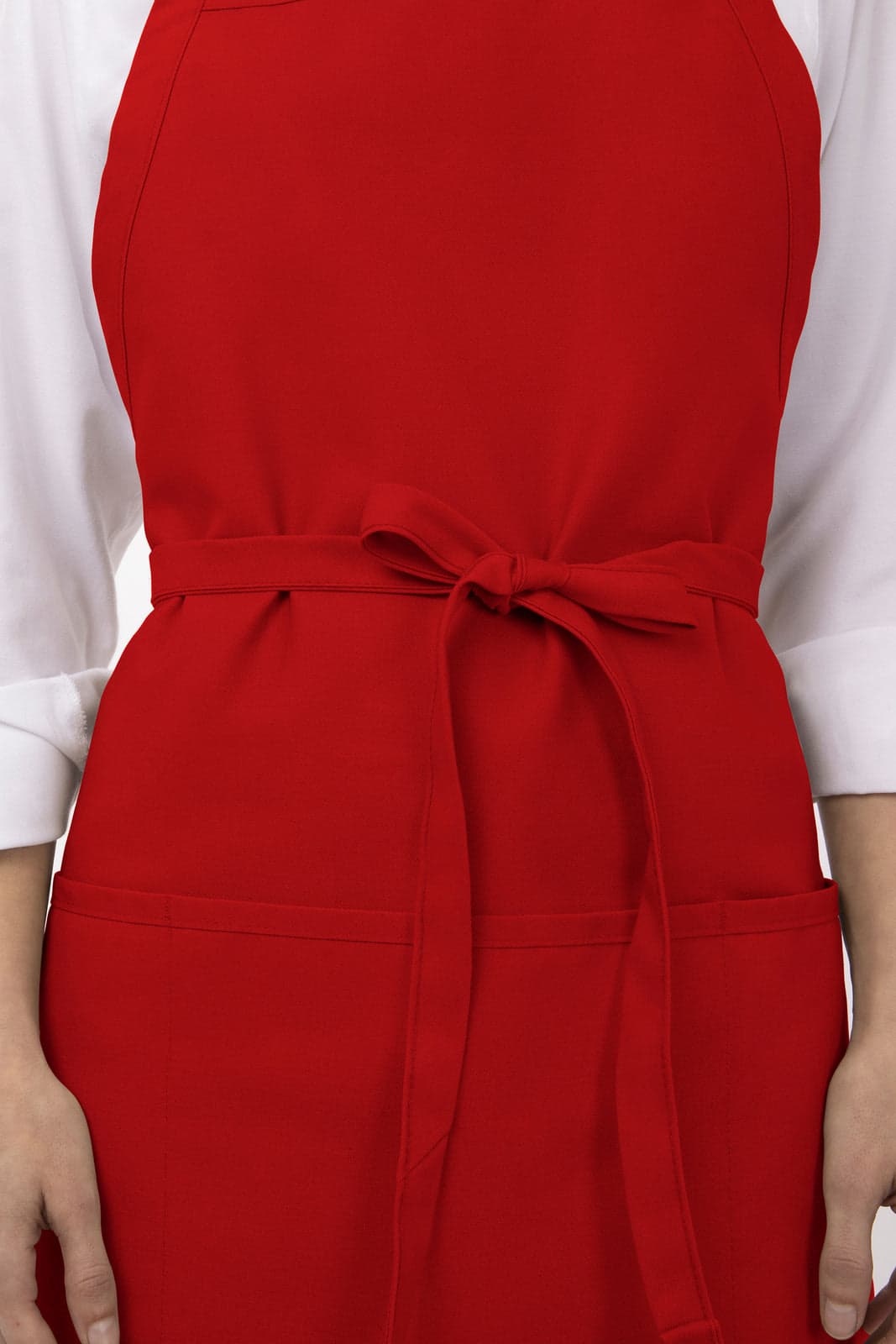 A red apron with three pockets and a tied waist, worn over a white shirt. It features a logo on the front.