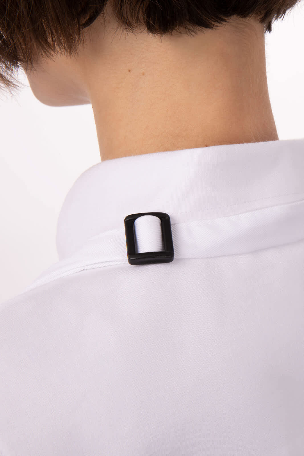 A close-up of a white shirt collar featuring a black clip at the back. The style is sleek and minimalistic.