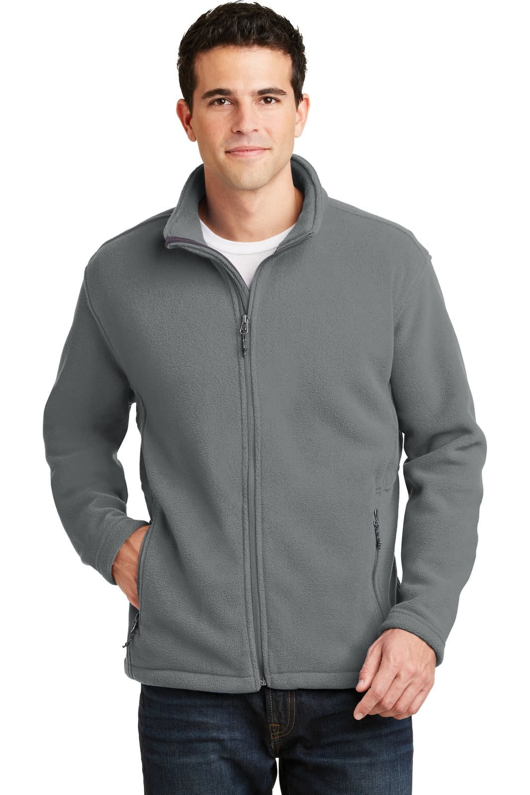 A man wearing a grey fleece jacket with a zippered front. The jacket has a logo on it.