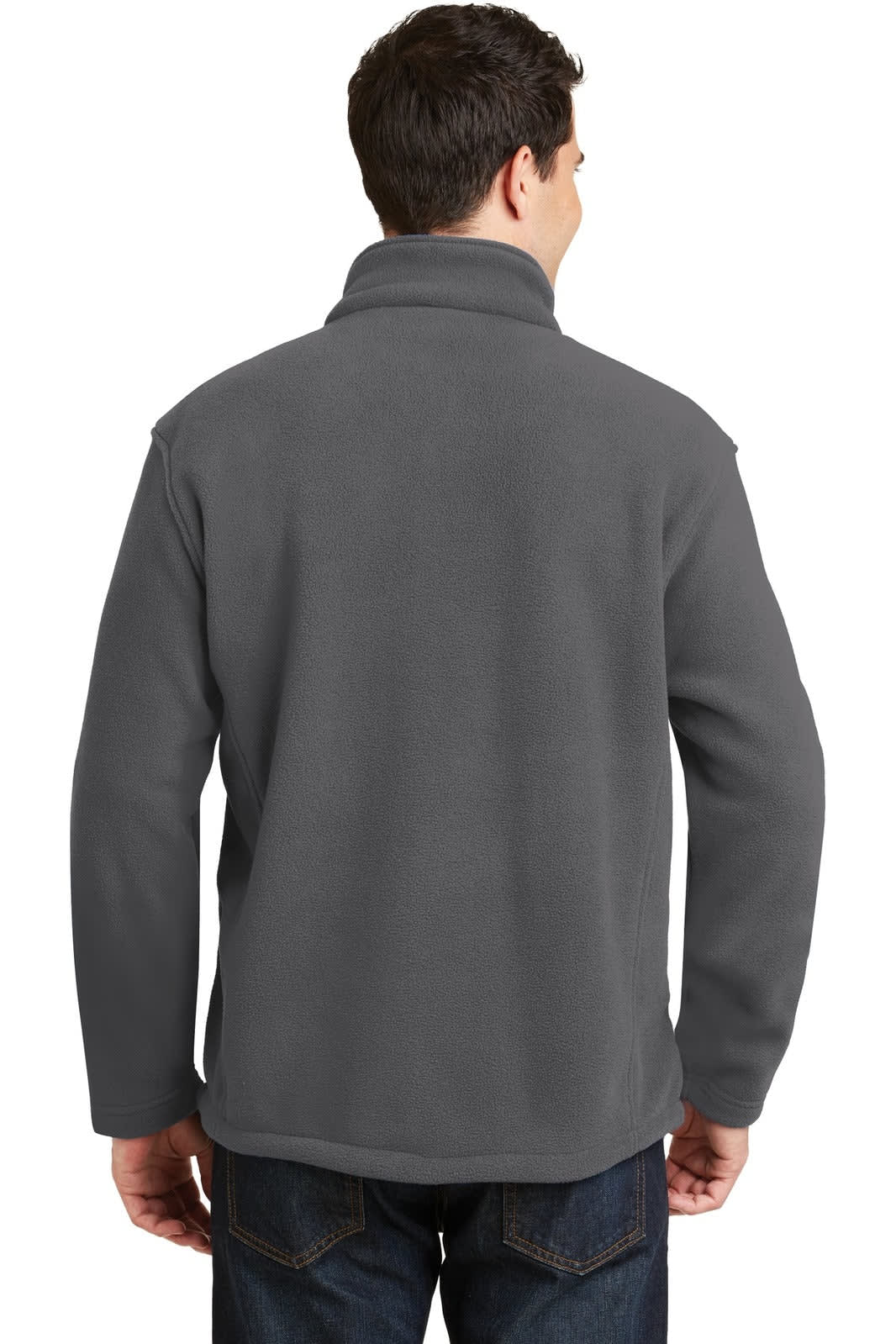 A man wearing a grey fleece jacket with a high collar, viewed from the back. The jacket has a logo on it.