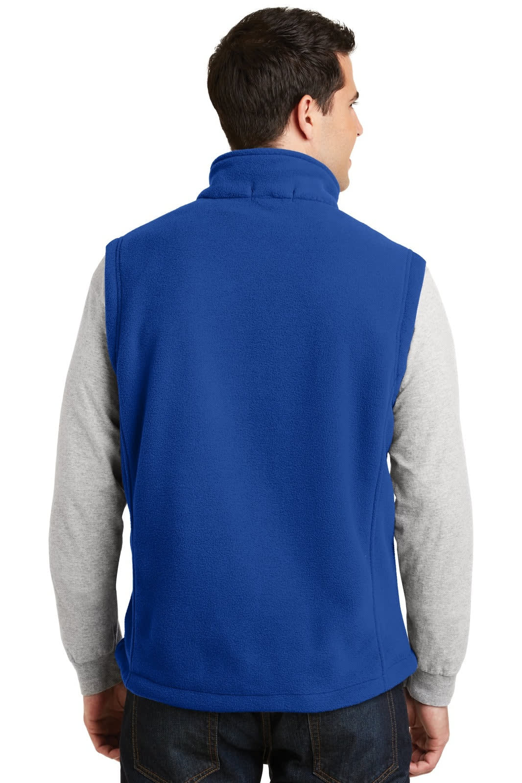 A blue fleece vest with a high collar, featuring a logo, viewed from the back. The wearer is in a grey long-sleeve shirt.
