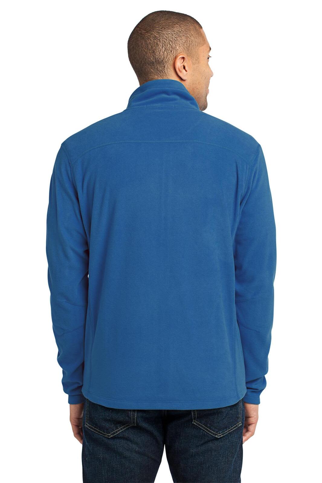 A blue microfleece jacket viewed from the back, featuring a high collar and a simple design.