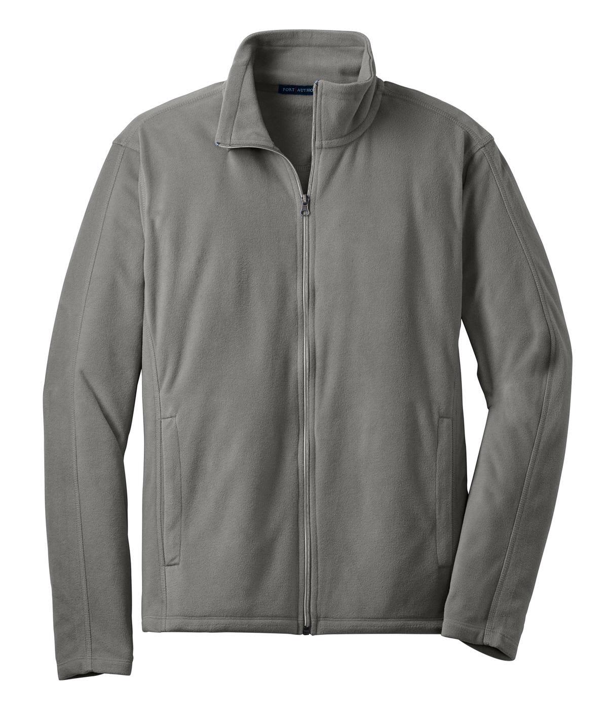 A grey microfleece jacket featuring a full front zip and side pockets, with a collar and a logo on the chest.