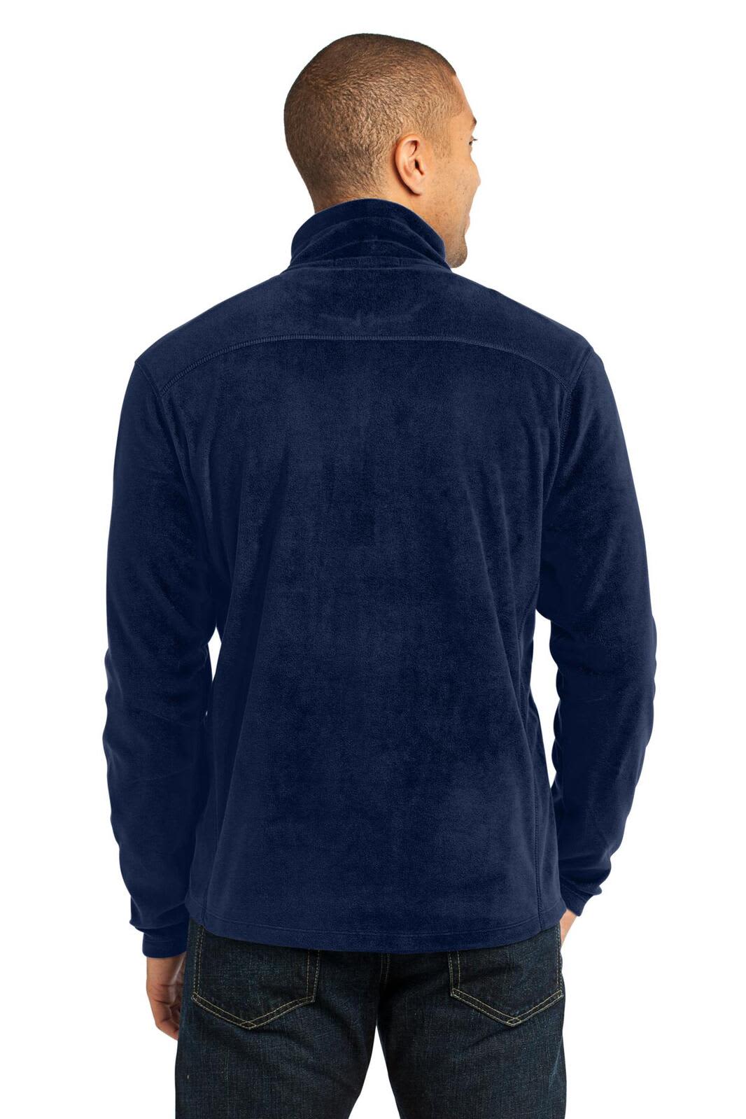 A navy blue microfleece 1/2-zip pullover with a high collar and a logo on the side.