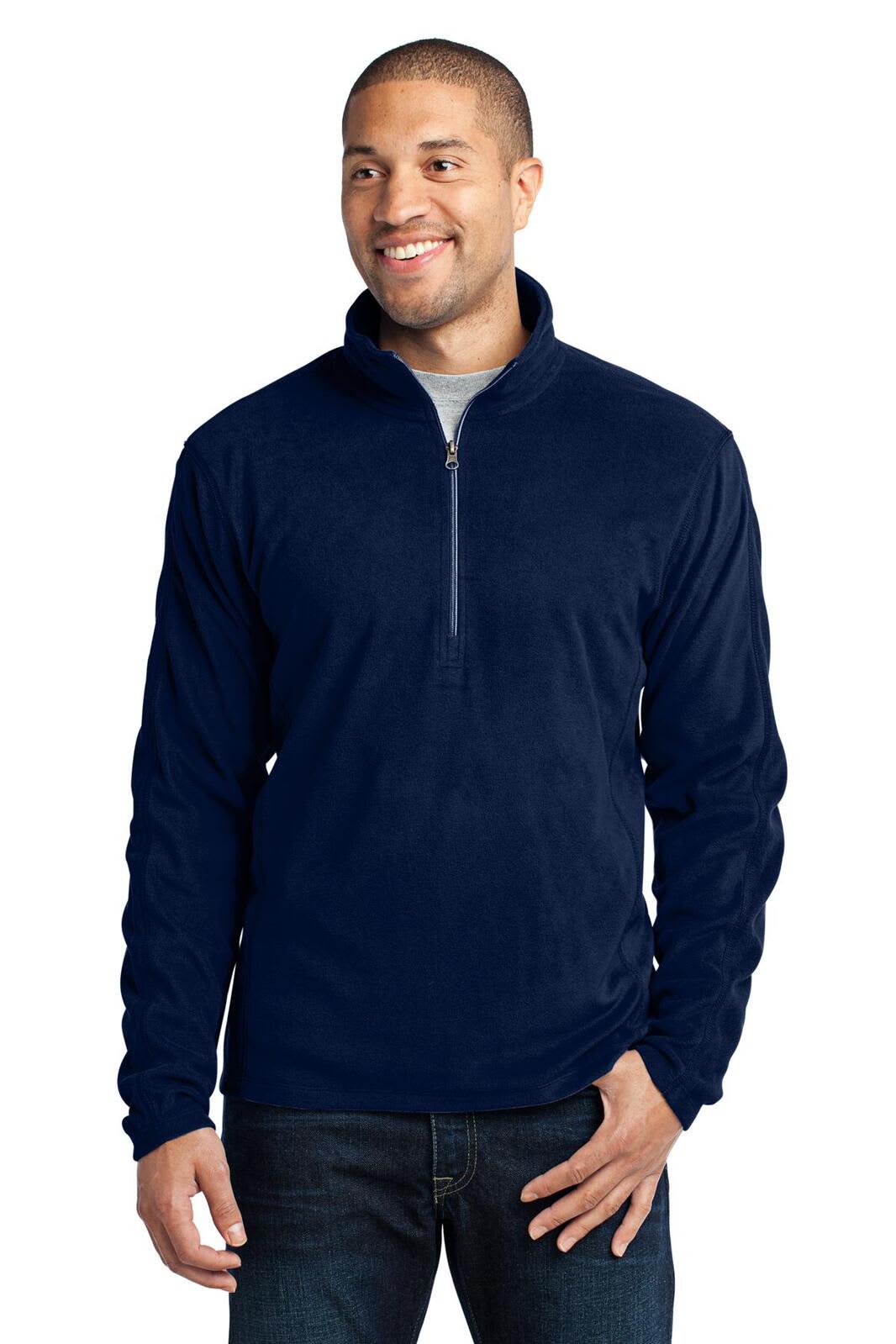 A man wearing a navy blue Port Authority Microfleece 1/2-Zip Pullover, featuring a zip neckline and a logo.
