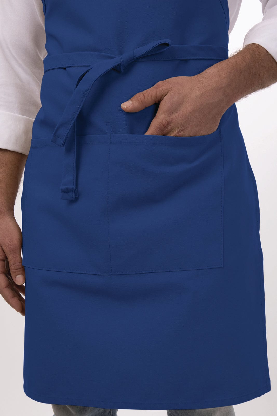 A blue bib apron featuring a front pocket and adjustable ties. The model is wearing a white shirt.