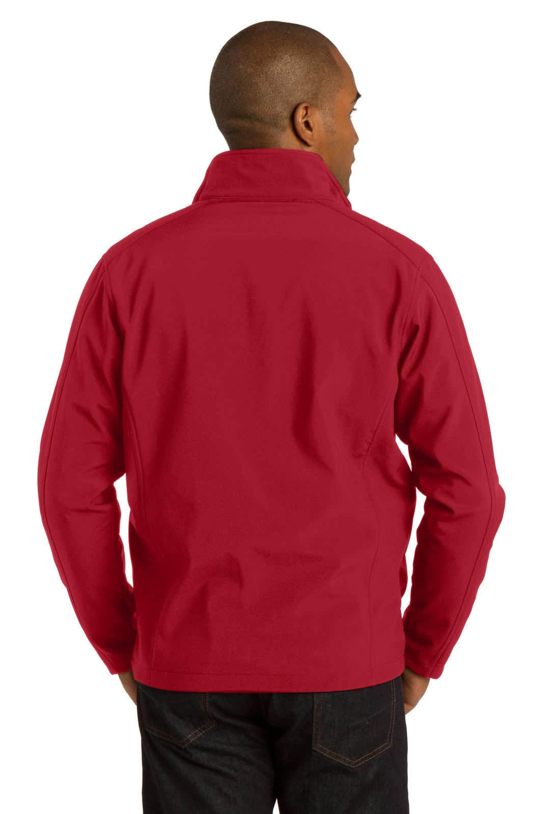 A man wearing a red Port Authority Core Soft Shell Jacket, viewed from the back. The jacket features a collar and has branding.