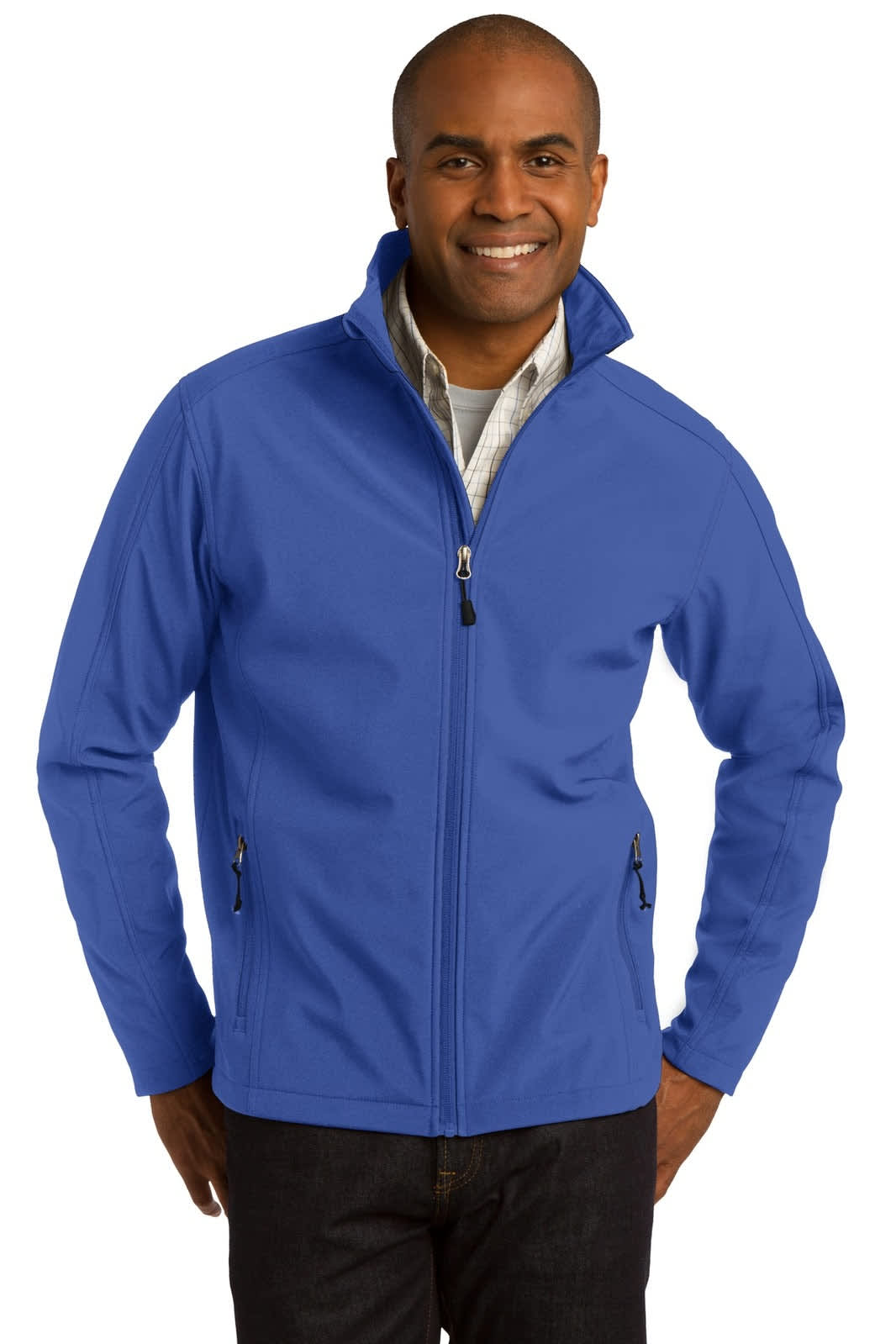 A man wearing a blue Port Authority Core Soft Shell Jacket, featuring a zip-up design and pockets.