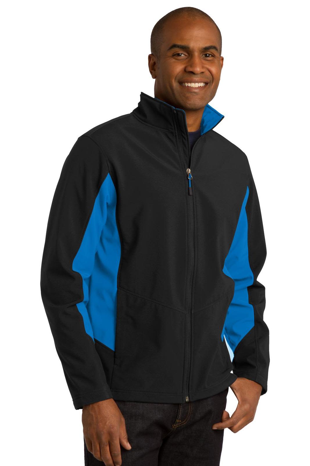 A person wearing a black and blue Port Authority Core Colorblock Soft Shell Jacket with a logo.