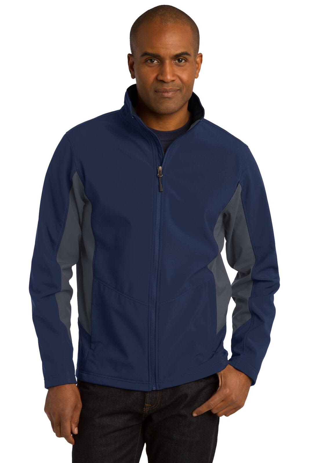 A man wearing a navy and grey Port Authority soft shell jacket, featuring a zip-front and a logo on the chest.