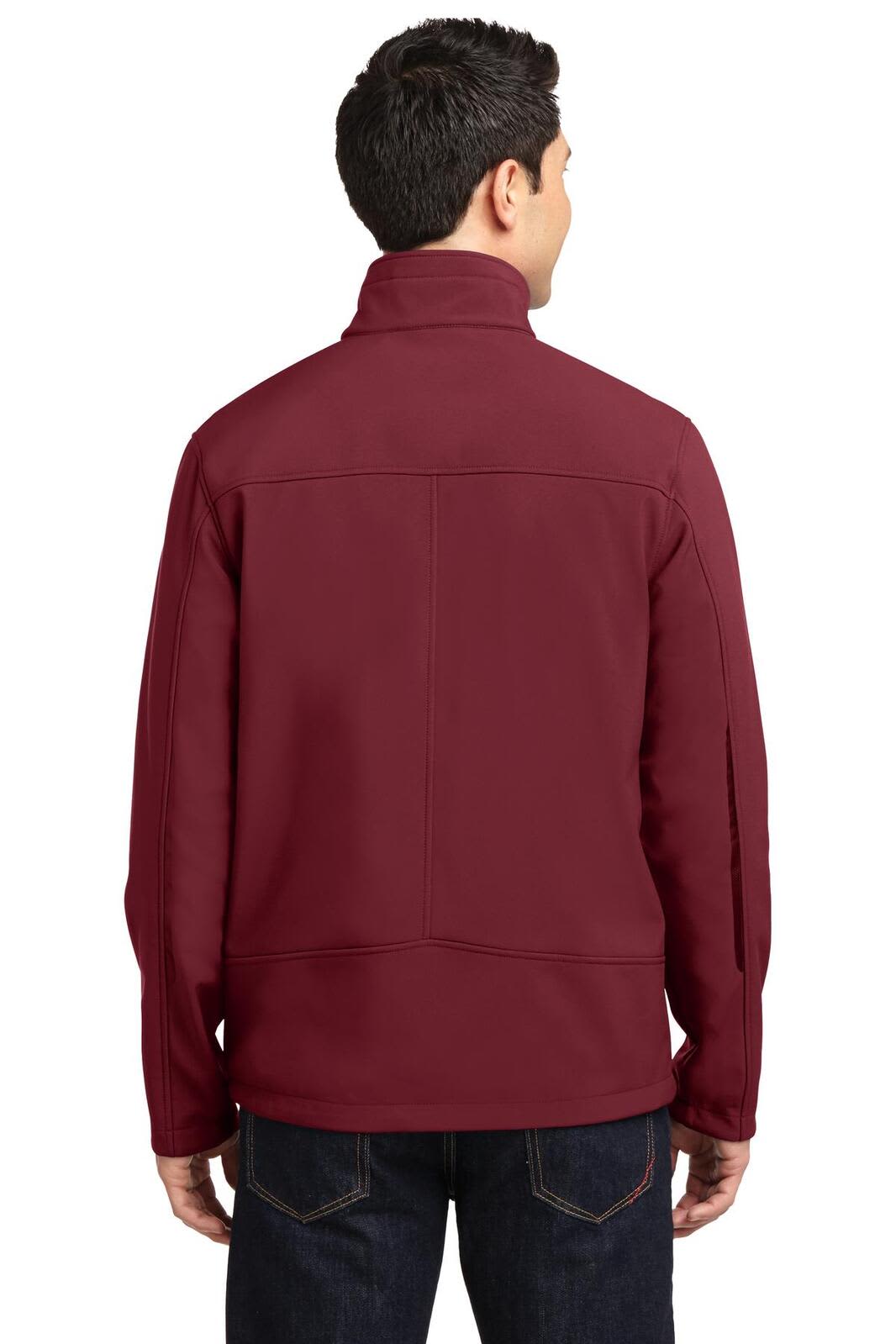 A man wearing a maroon Port Authority Welded Soft Shell Jacket, viewed from the back, featuring a logo on the sleeve.
