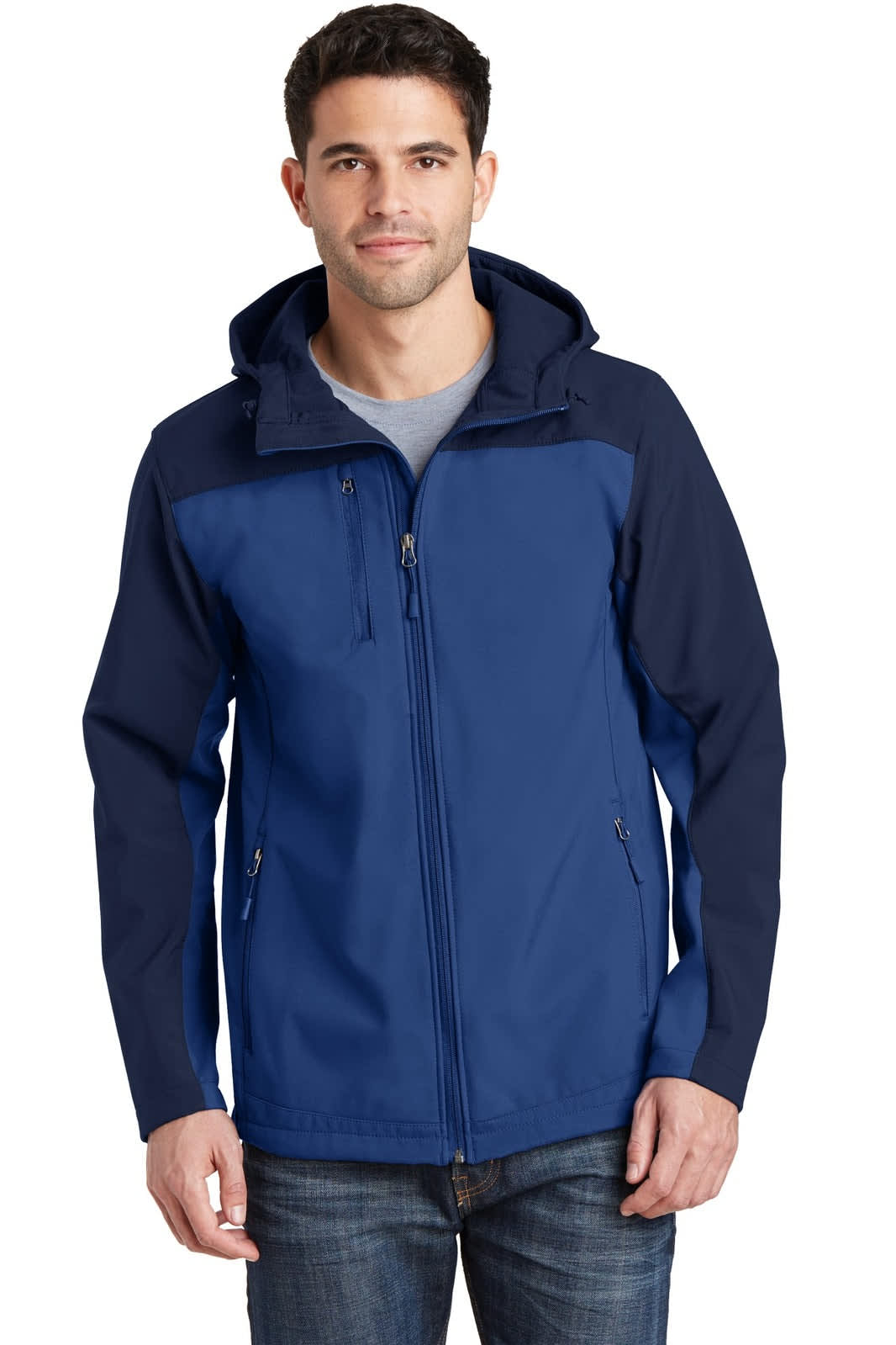 A soft shell jacket in navy blue with a hood, featuring a logo on the chest and zippered pockets.