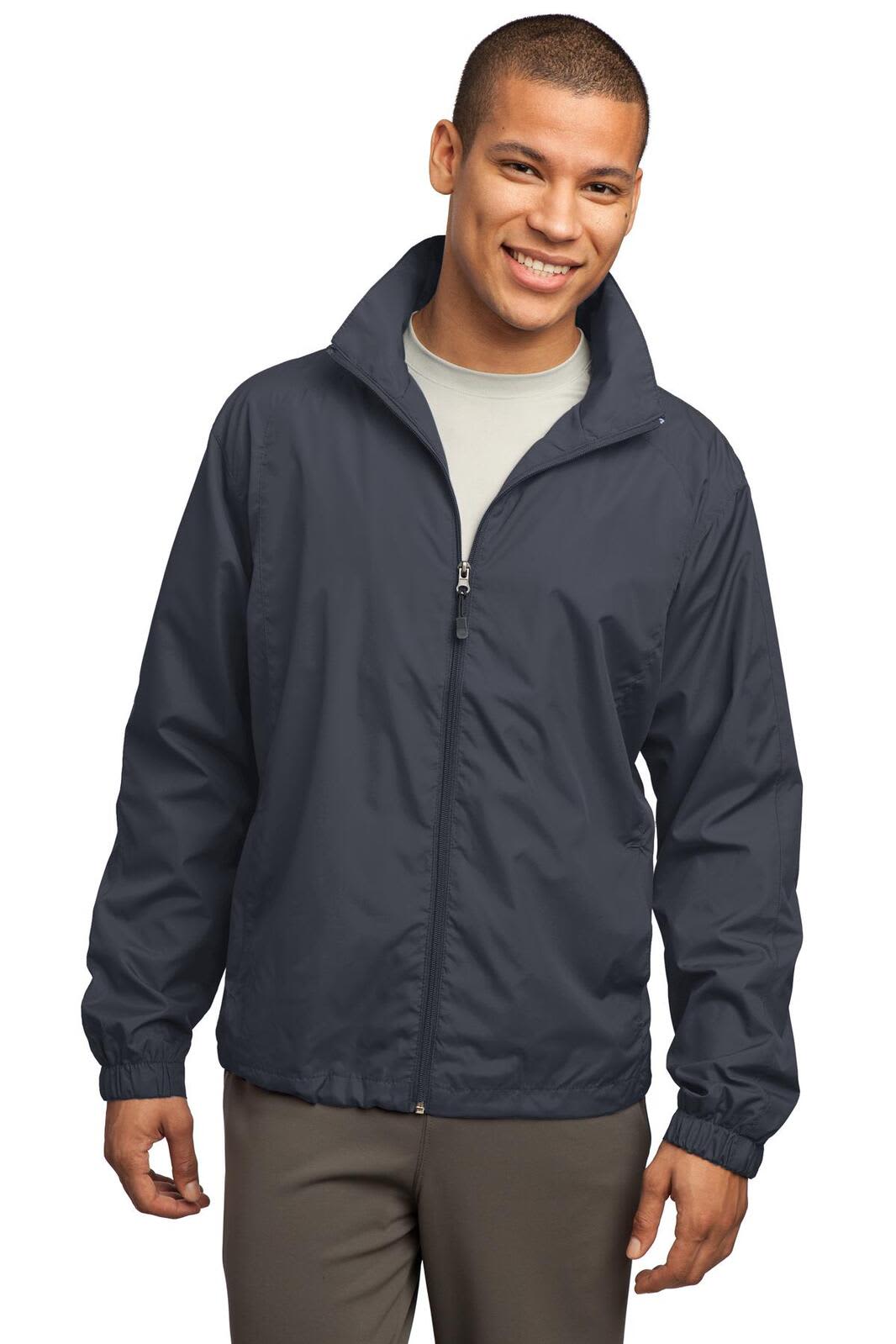 A full-zip wind jacket in navy blue, featuring a collar and a logo, worn by a smiling individual.