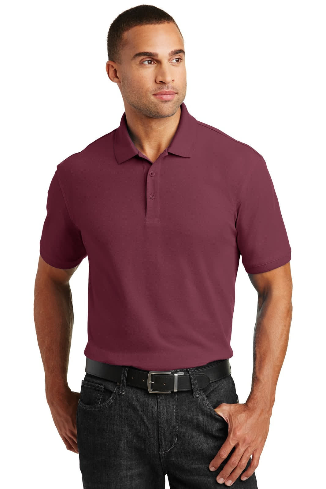 A burgundy polo shirt on a model, featuring a collar and short sleeves, with a branding logo.