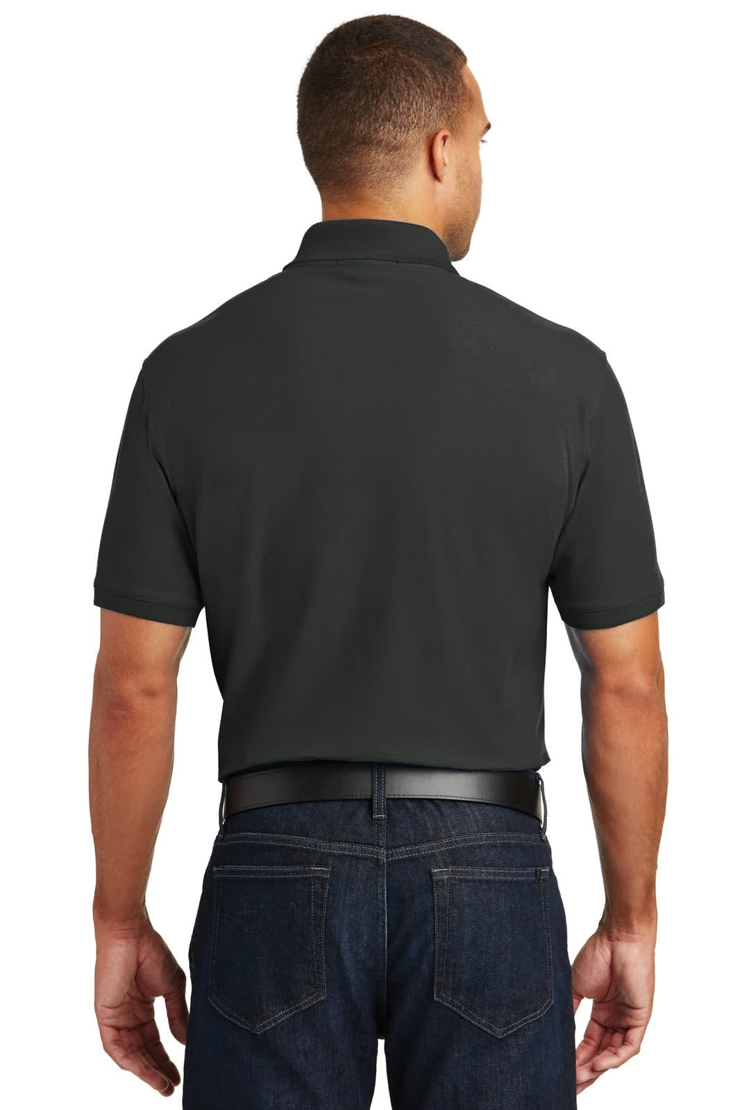 A man wearing a black polo shirt, viewed from the back, with short sleeves and a collar.