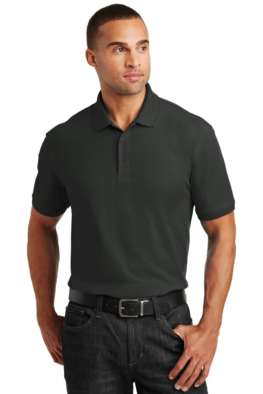 A man wearing a black polo shirt with a collar. The shirt features a logo on the chest.