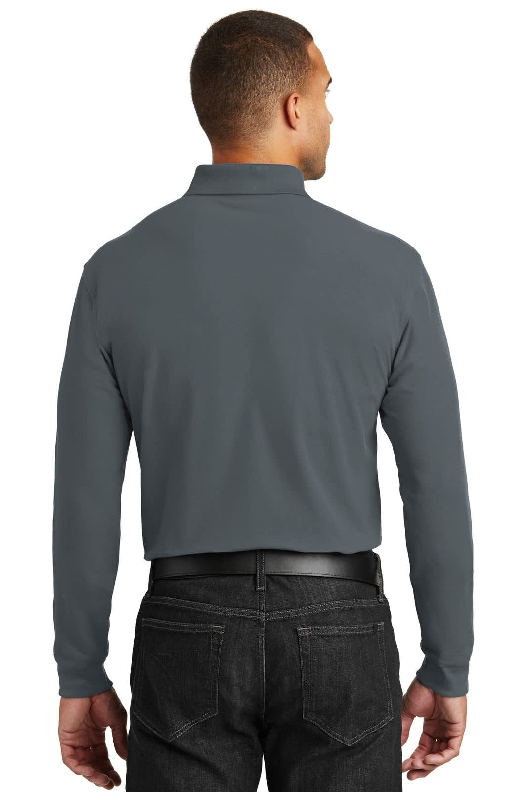 A long sleeve, dark grey polo shirt with a collar and a logo on the back, worn with black jeans.