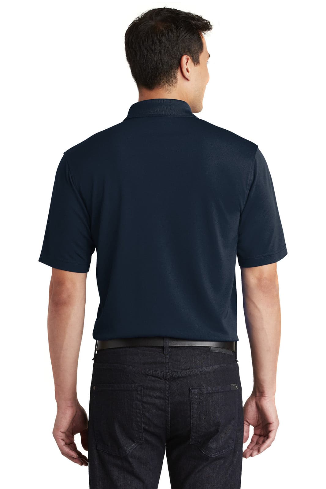 A man wearing a navy polo shirt from the back, featuring a pocket and a logo.