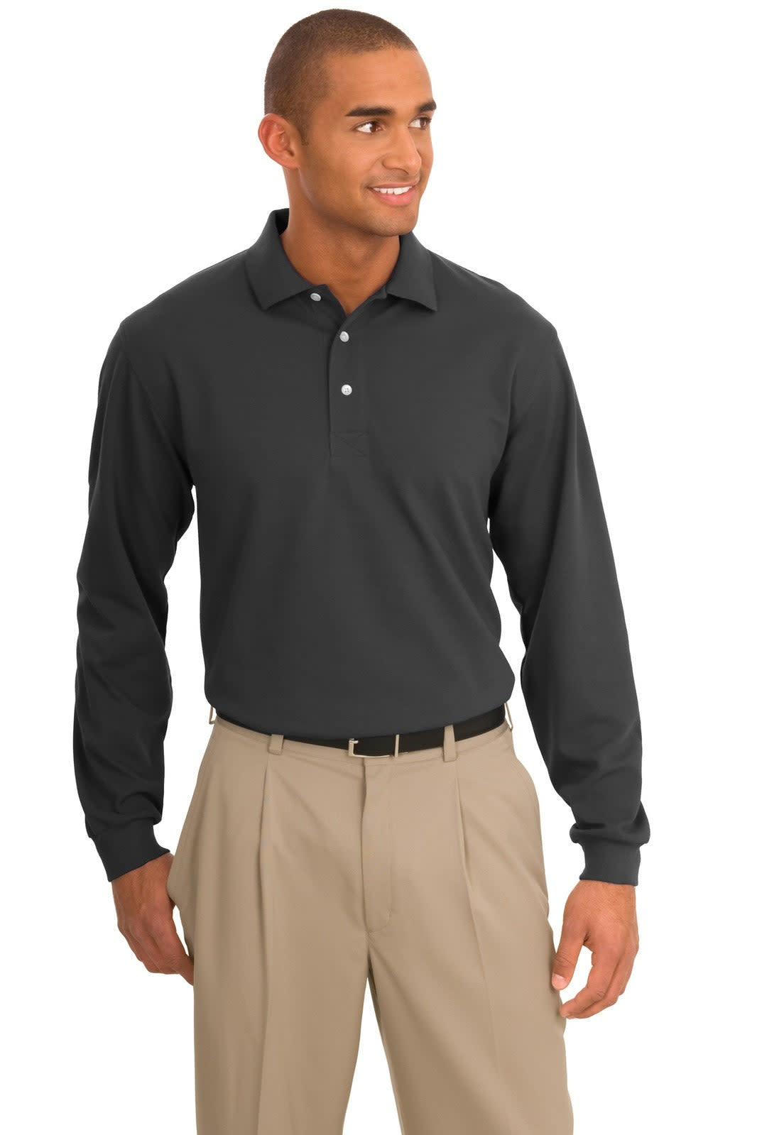 A long sleeve polo shirt in dark grey, featuring a collar and a logo. Paired with beige trousers.