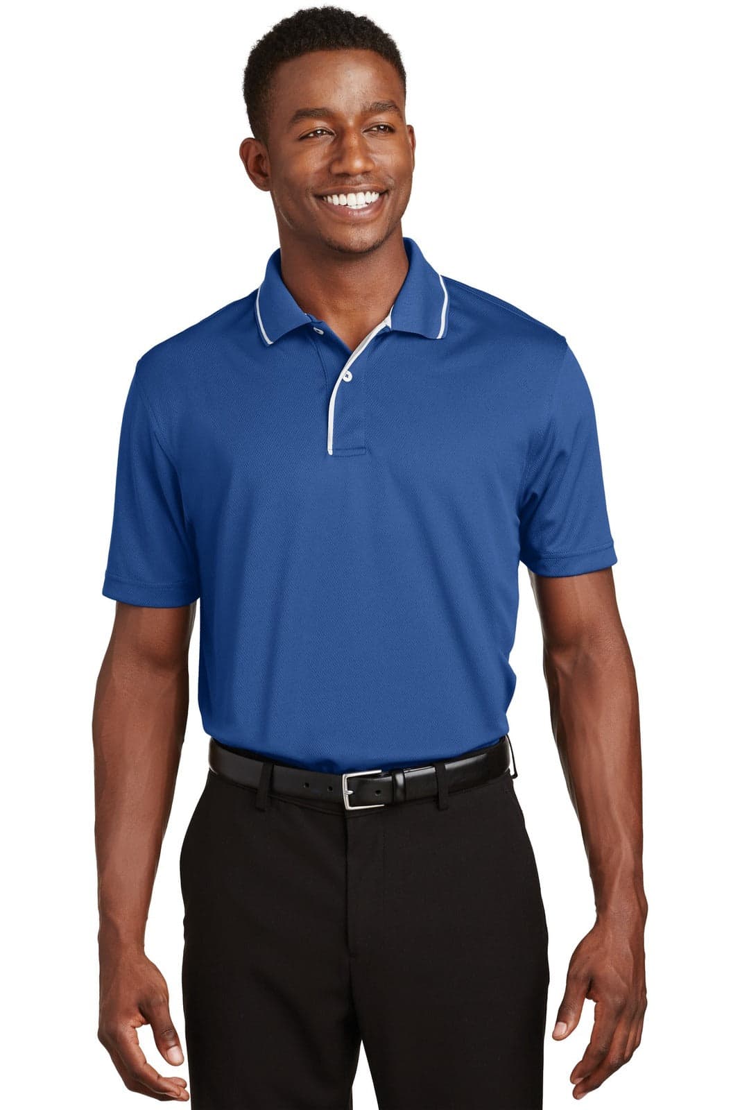 A blue Sport-Tek Dri-Mesh polo shirt featuring a tipped collar and piping, worn by a smiling model.