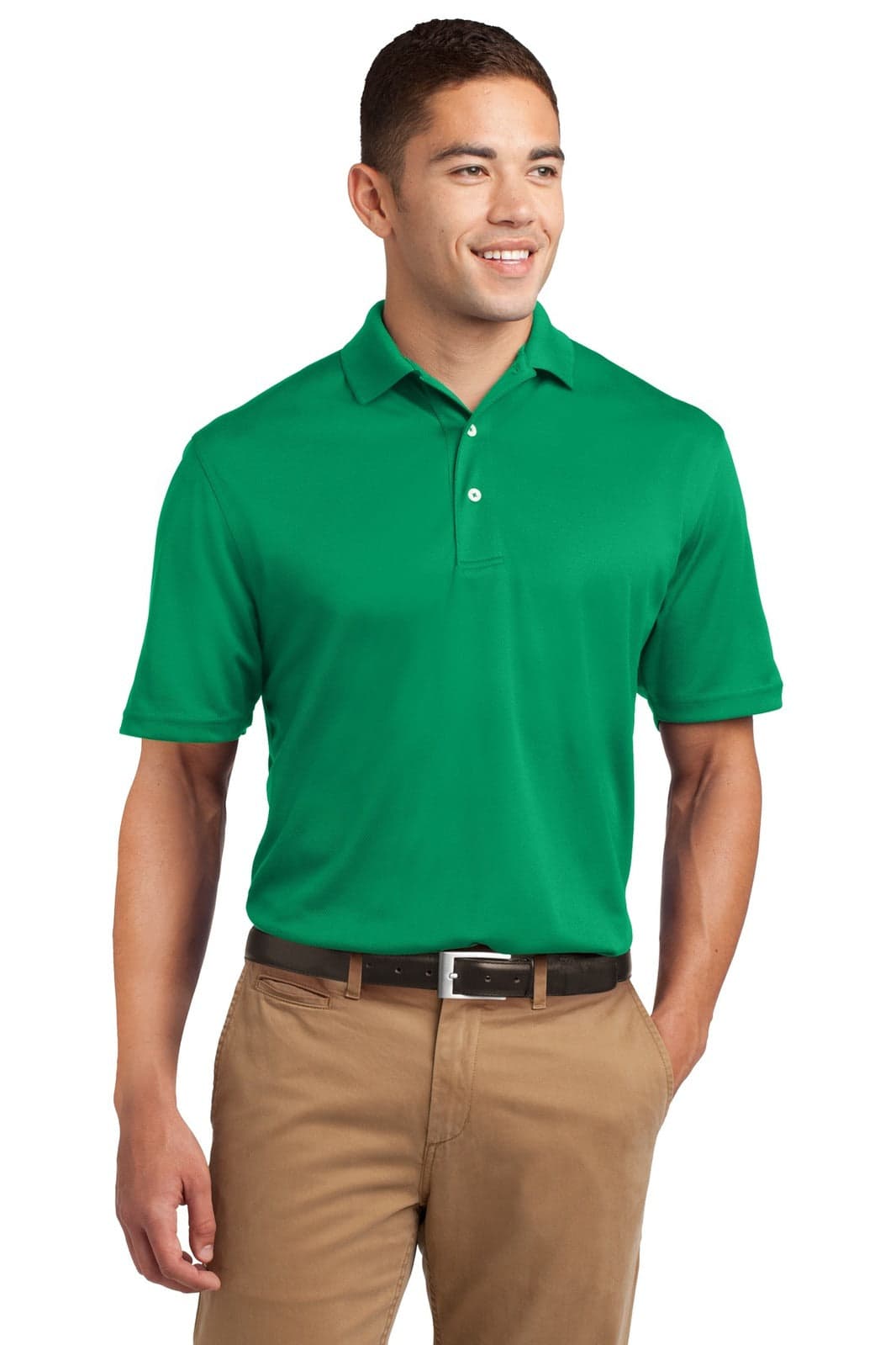 A man wearing a bright green Sport-Tek Dri-Mesh polo shirt, paired with beige pants. The shirt features a logo.