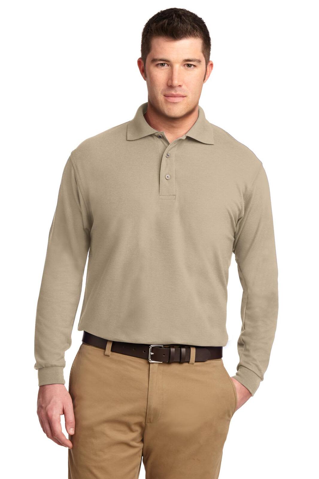 A long sleeve polo shirt in tan, featuring a collar and a logo on the chest area.