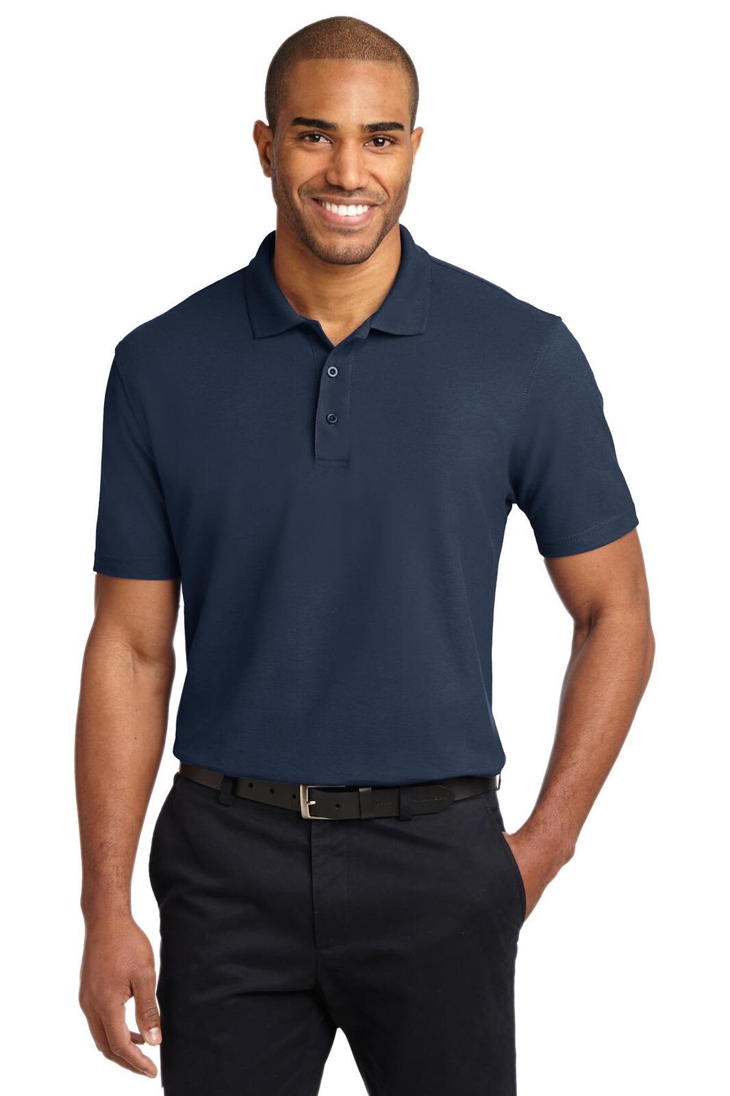 A short-sleeved navy polo shirt worn by a man, featuring a collar and a logo on the chest.