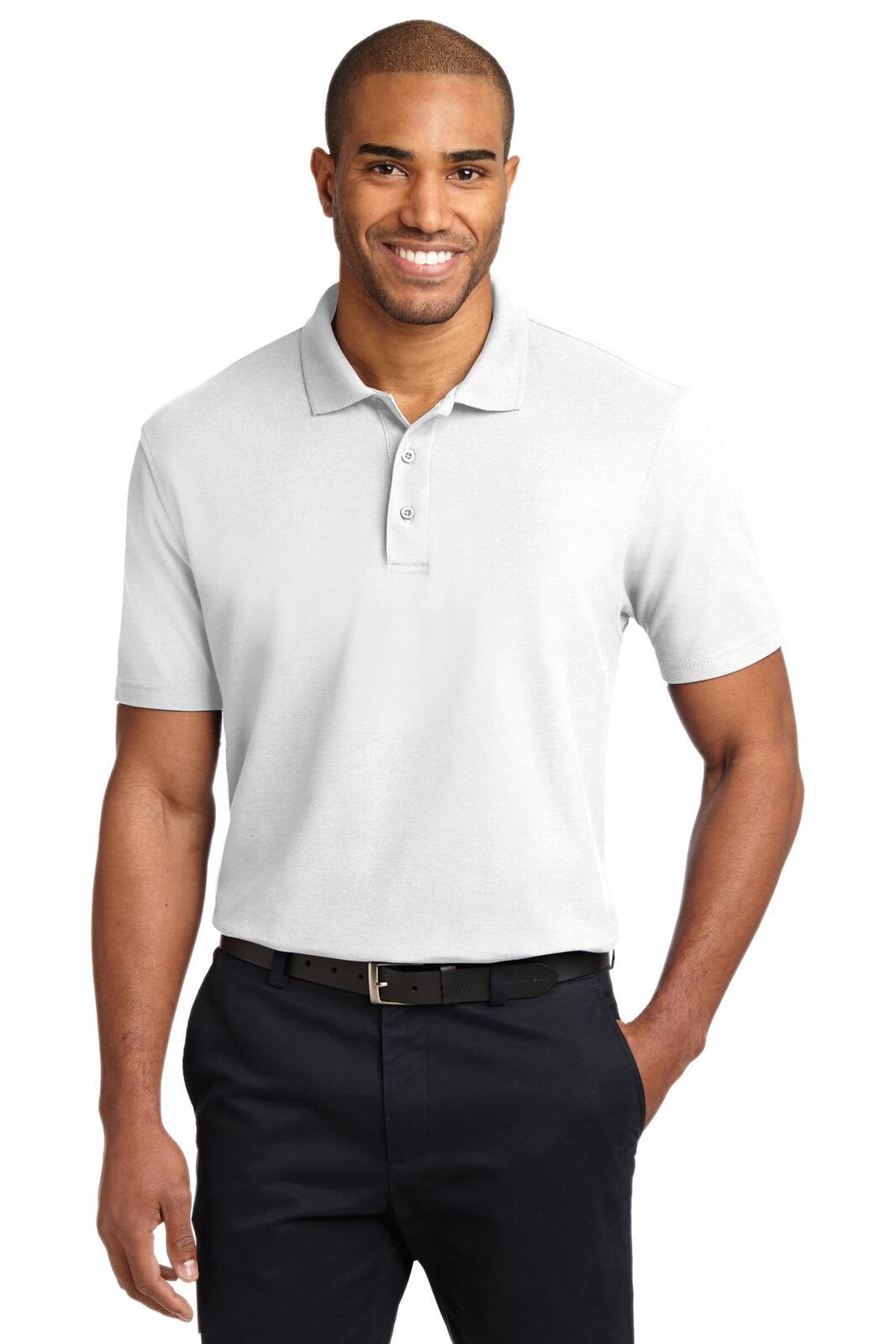 A light grey, short-sleeved polo shirt is being worn by a smiling man, featuring a logo. He's styled with dark trousers.