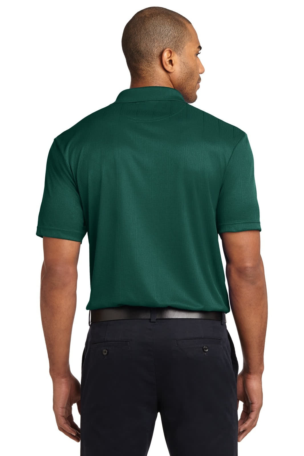 A green Port Authority Performance Fine Jacquard Polo shirt, featuring a short sleeve design and a logo on the back.