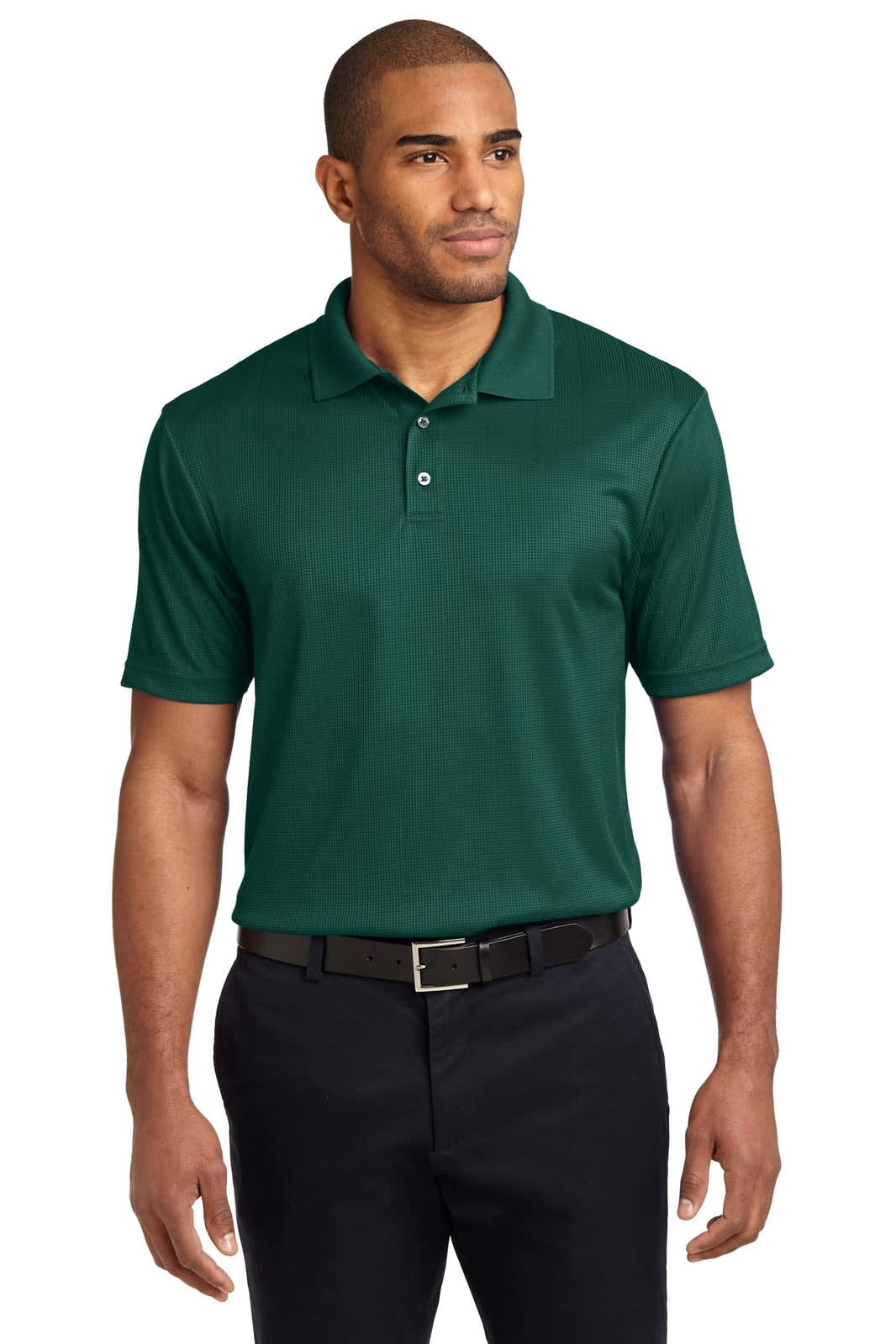 A dark green short-sleeved polo shirt with a collar, featuring a logo. The model is wearing black trousers.