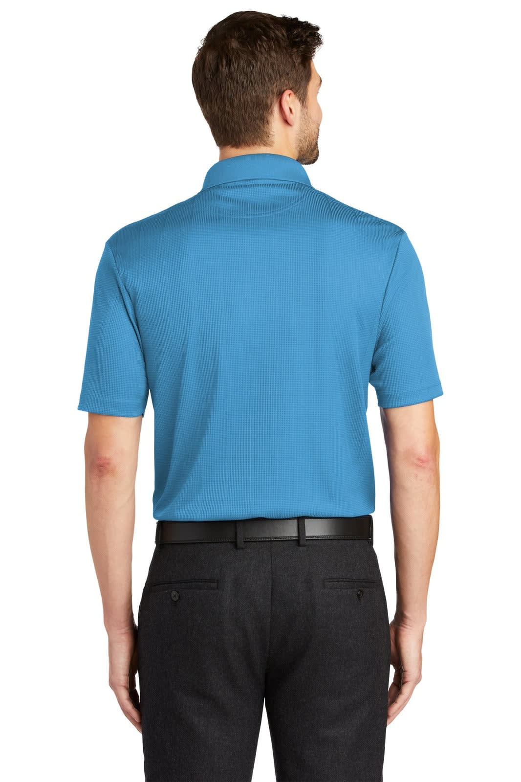A man wearing a blue polo shirt with a short sleeve, shown from the back, paired with black trousers.