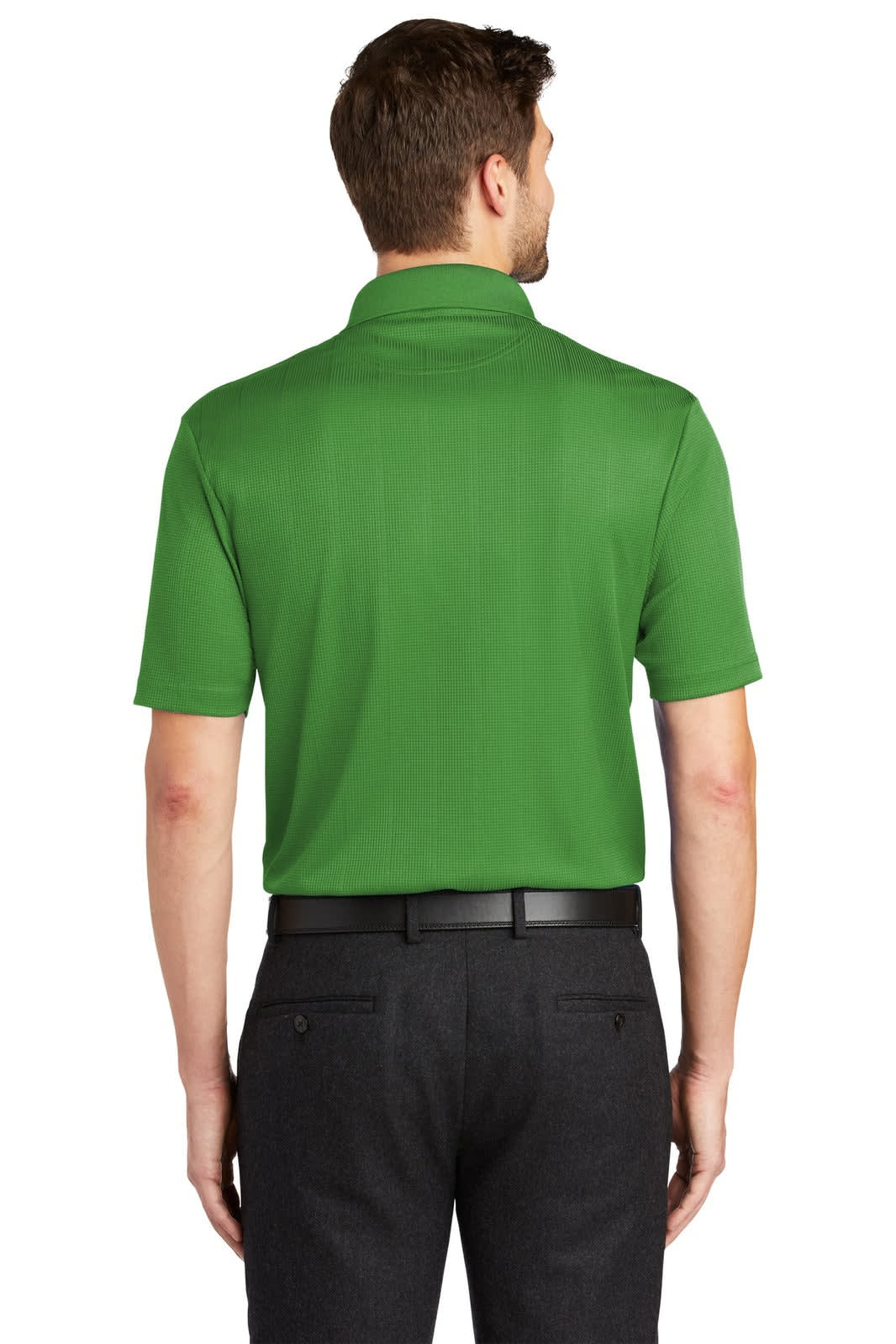 A green short-sleeve polo shirt with a collar, featuring a logo on the back, worn with black trousers.