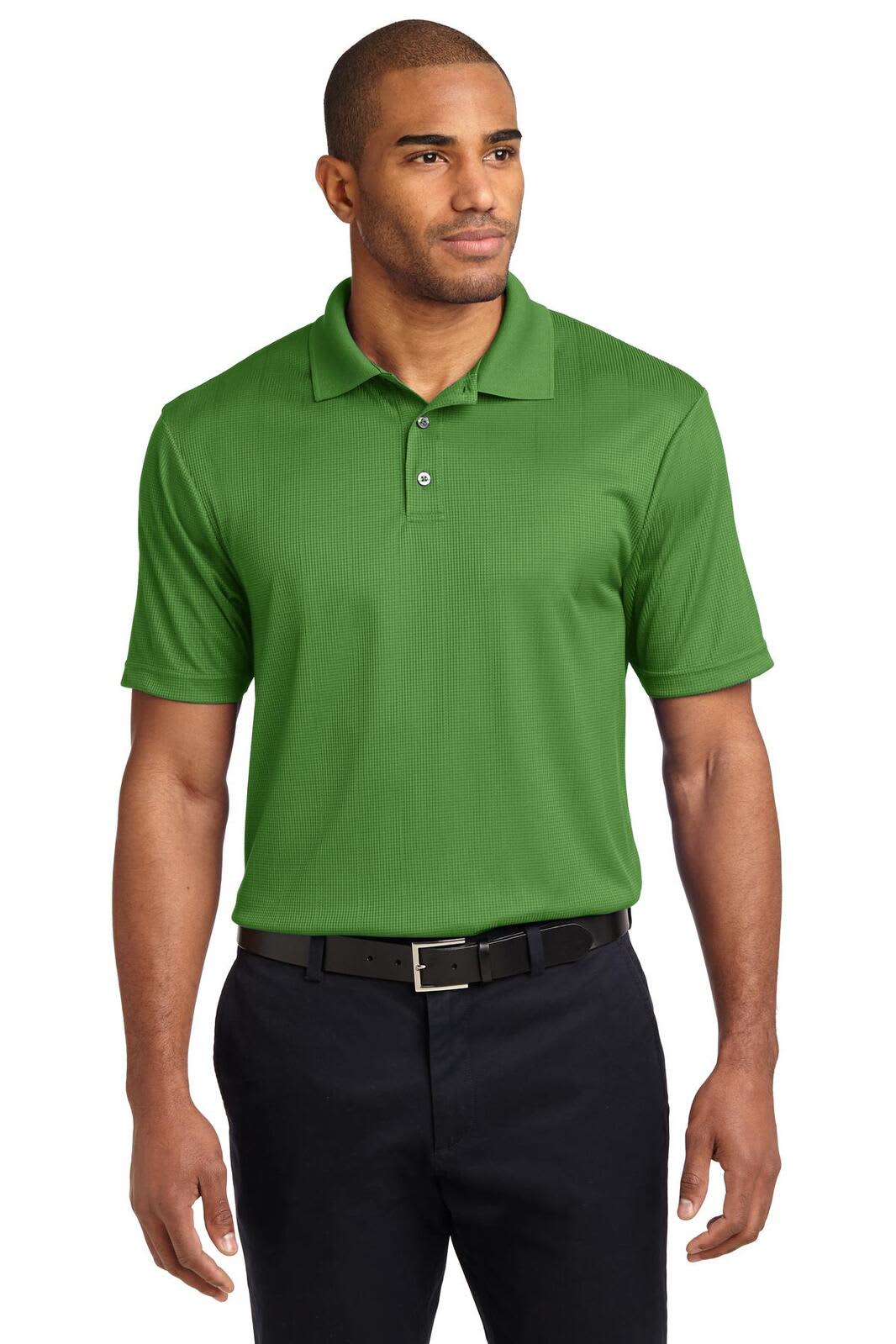 A green Performance Fine Jacquard Polo shirt worn by a man, featuring a collar and a logo on the chest.