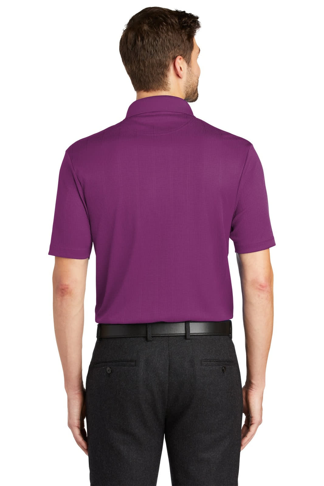 A man wearing a purple Port Authority Performance Fine Jacquard Polo, viewed from the back, paired with black trousers.