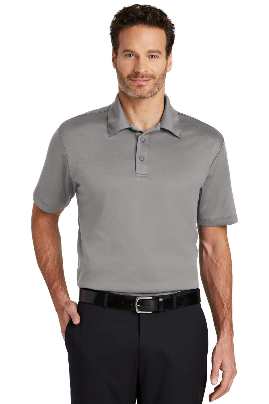 A grey polo shirt on a man, featuring a classic collar and a logo on the chest.