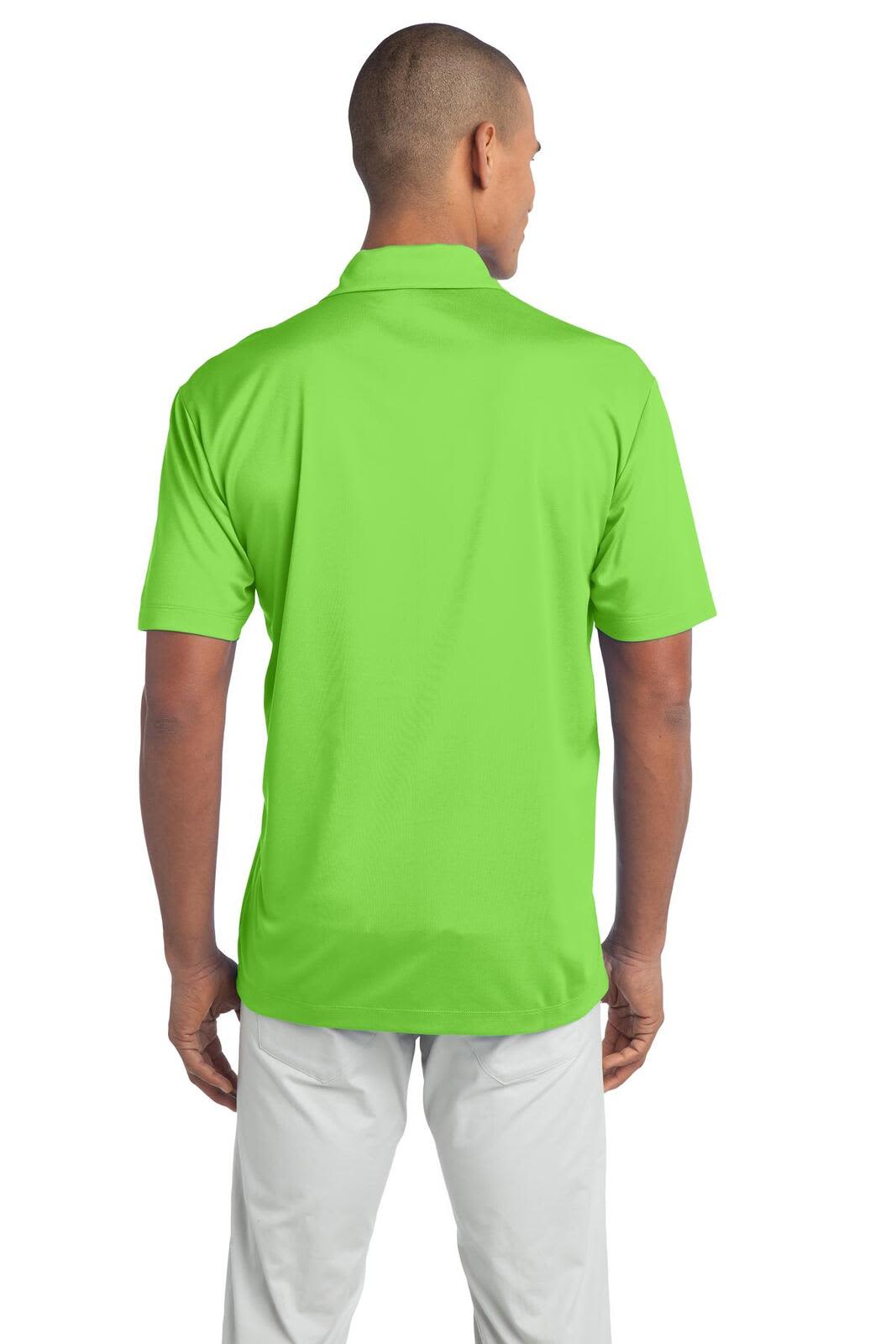 A green Port Authority Silk Touch Performance Polo shirt, viewed from the back, featuring a logo.