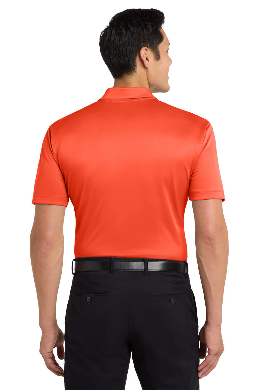 A man wearing a bright orange polo shirt with a collar, viewed from the back, paired with black trousers.