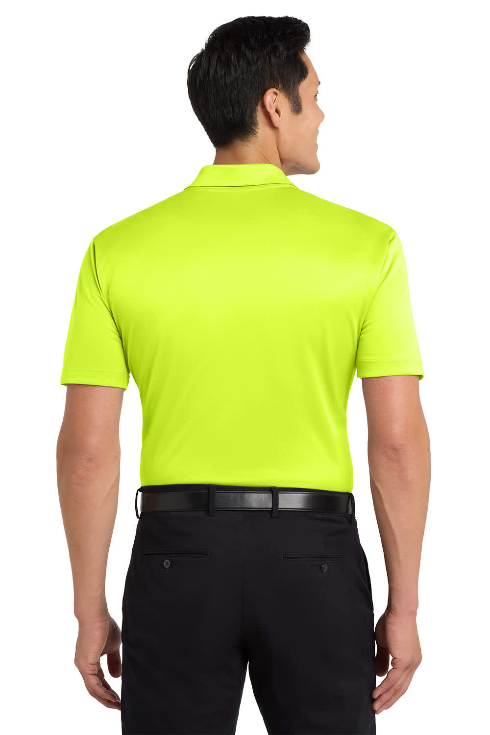 A man wearing a bright yellow polo shirt, seen from the back, with black trousers. The shirt features a logo.
