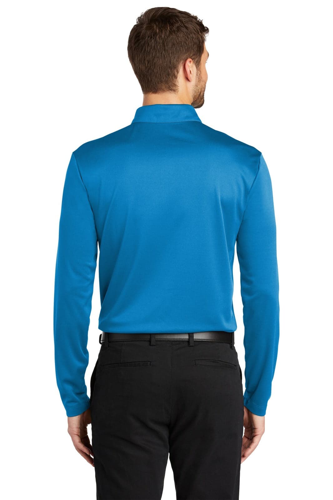 A back view of a man wearing a long sleeve polo shirt in vibrant blue, paired with black trousers. The shirt has a logo.