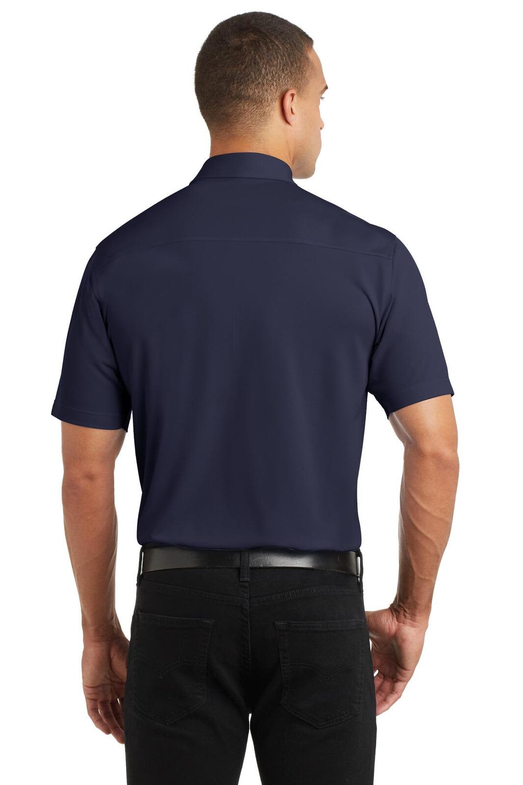 A navy blue polo shirt displayed from the back, featuring a short sleeve design and a collar.